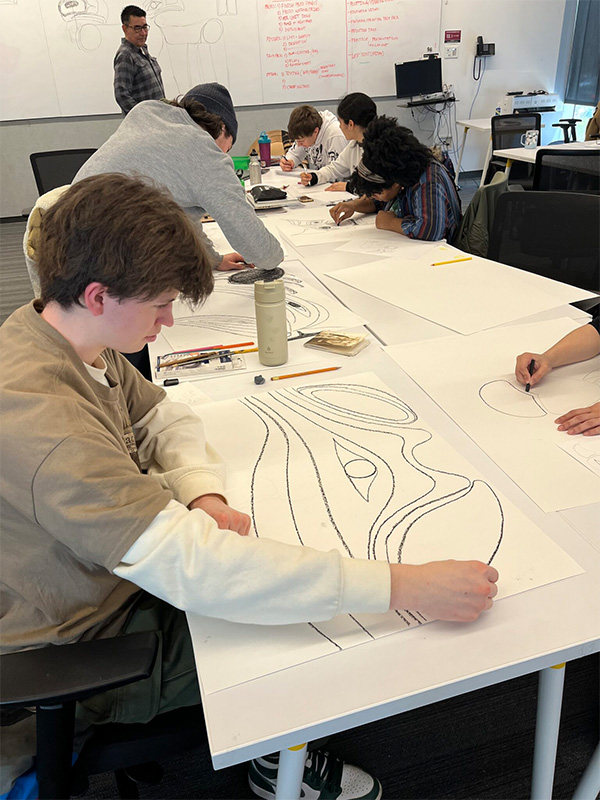 Student working on drawing during Khlatie-bhi's West Coast Art workshop