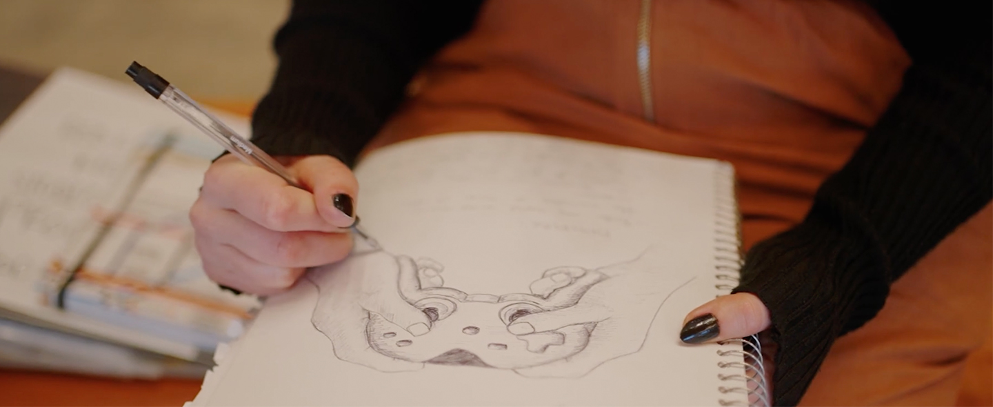 Banner image of Rebekah sketching