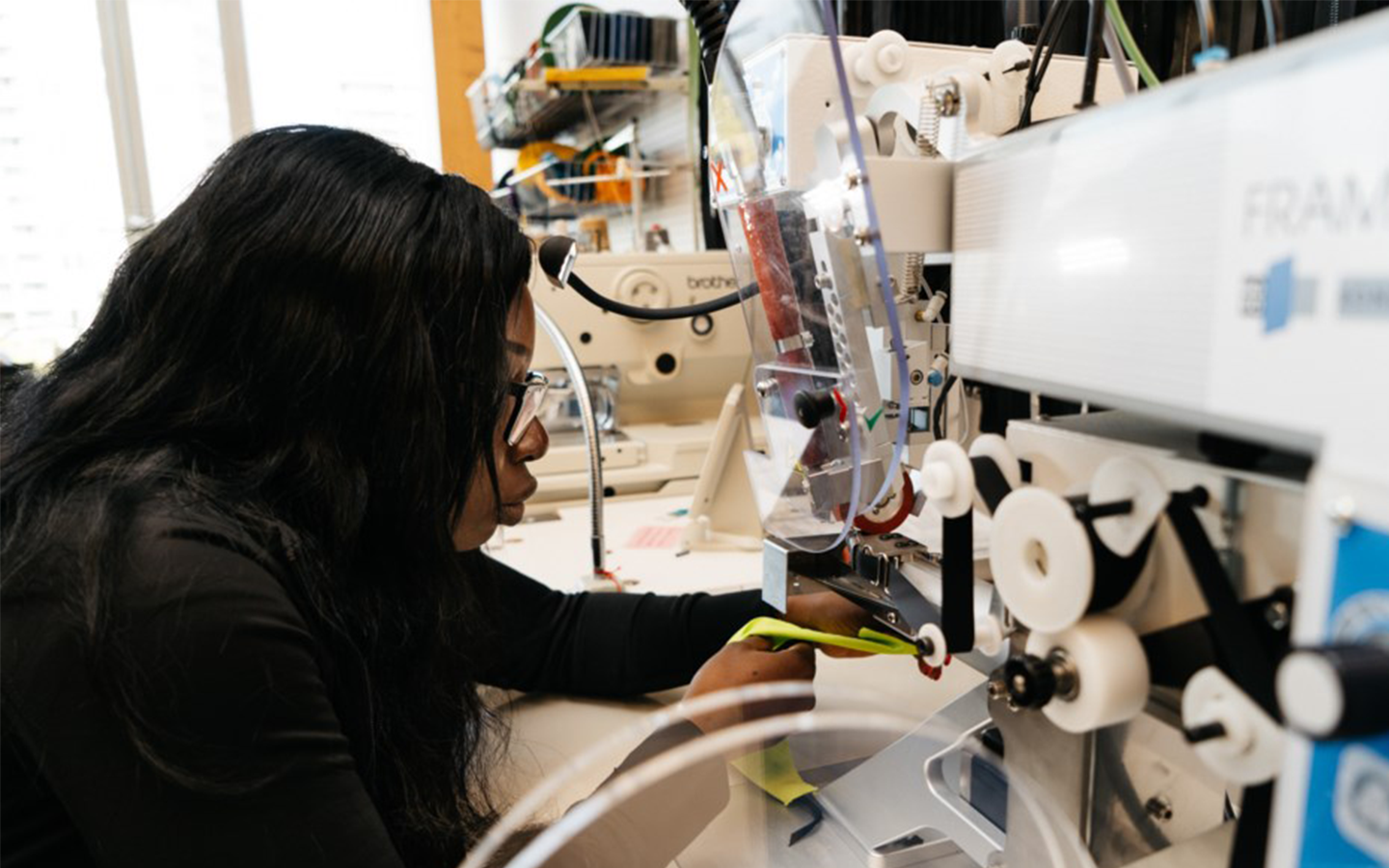 Student at technical Industrial Sewing Machine.